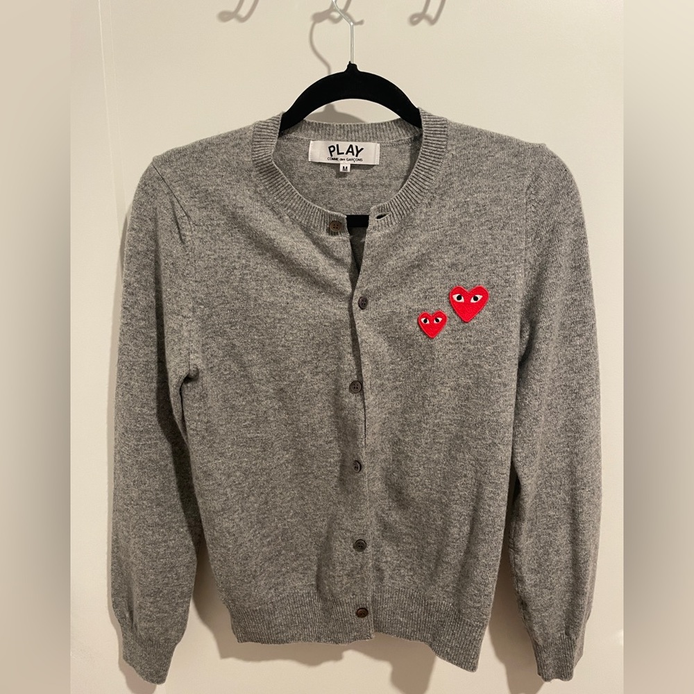 CDG Play logo Carigan